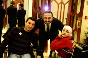 Actor Kosai Khouli and Youth Ability Summit Participants Abdel Rahman and Hiba
